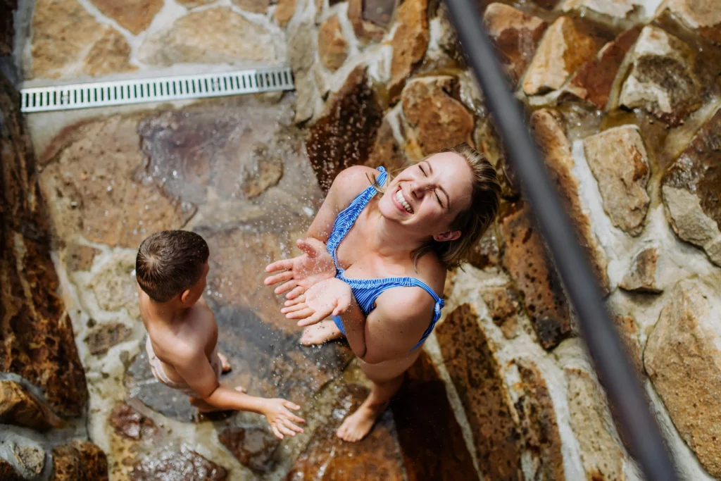 Woman laughing in the shower