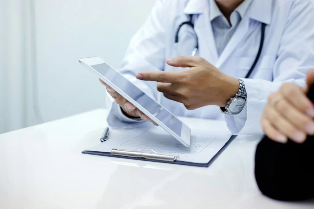 image of doctor discussing is hair transplant surgery worth it during consultation