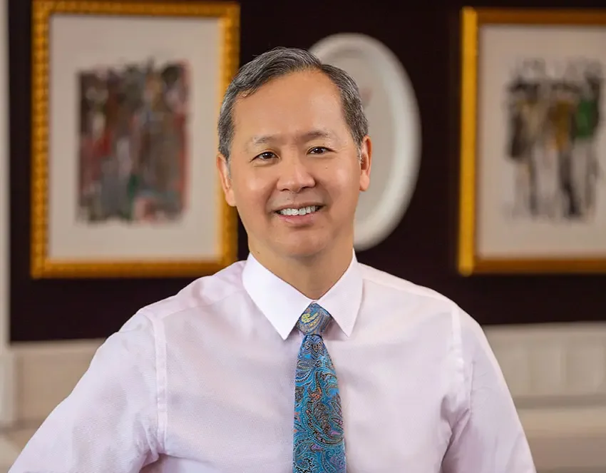 image of Dr. Adrian Lo board-certified plastic surgeon offering hair restoration services in Philadelphia
