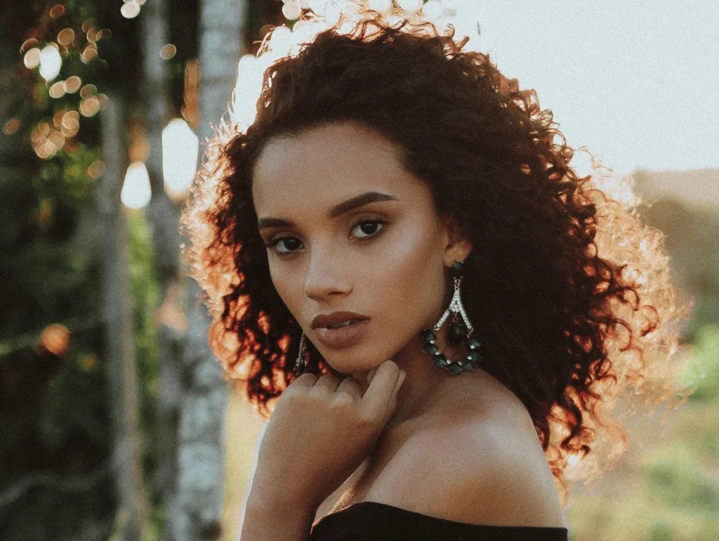 image of a confident woman embracing her look after rhinoplasty in New Jersey