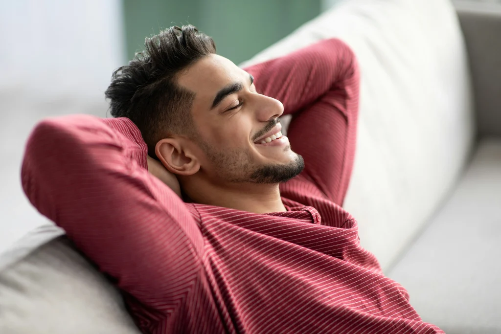 Image of a patient relaxing during hair transplant recovery